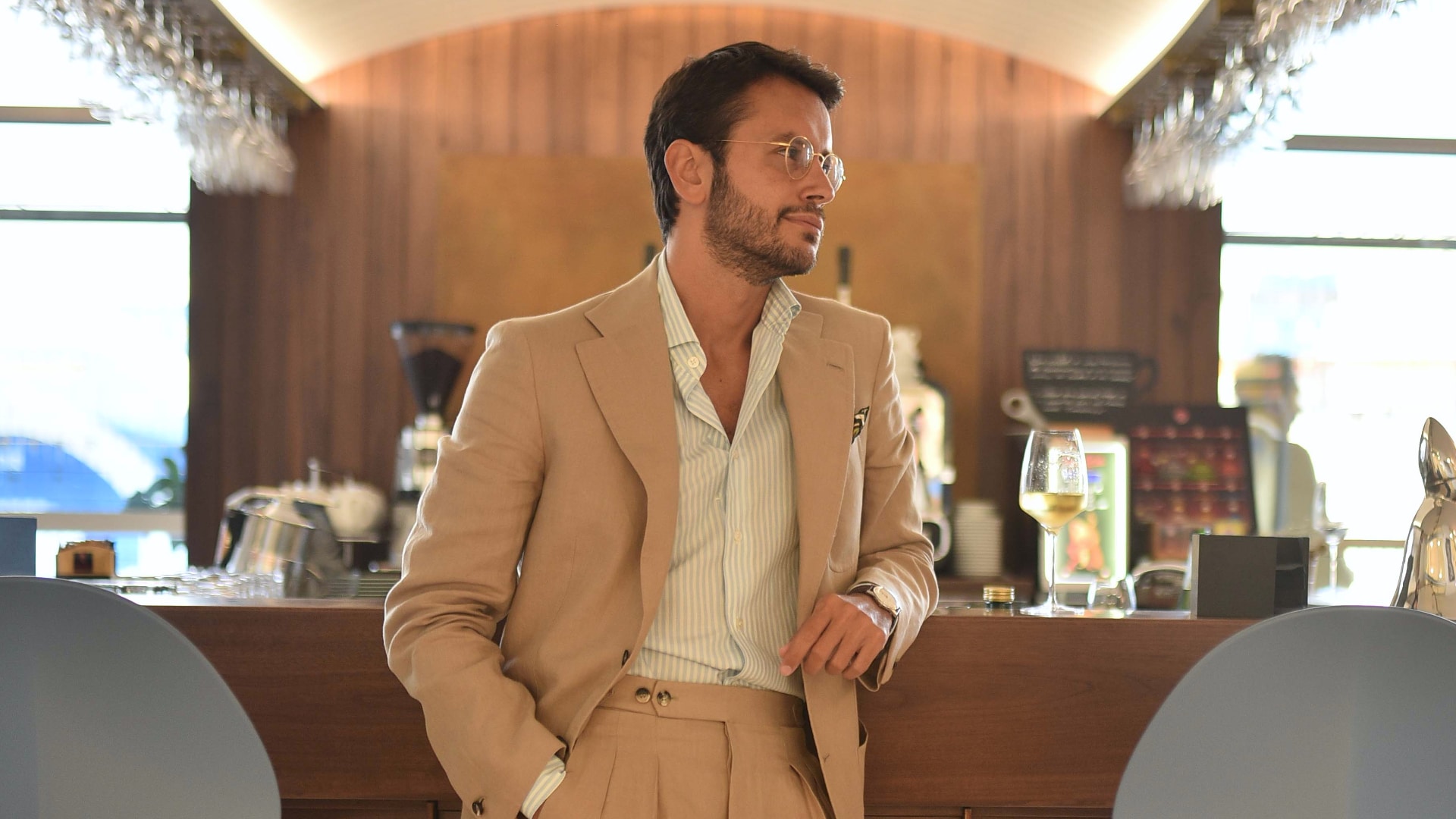 Menswear influencer Fabio Attanasio, in a Officine Paladino OP1901 Sandcastle linen suit created by Dalcuore. Photo by Vincent Montuori.