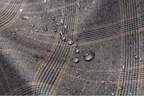 A brown wool fabric with glen plaid pattern