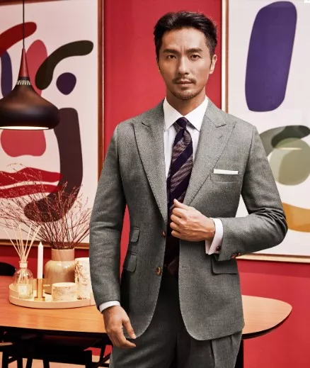 Man wearing a grey wool suit