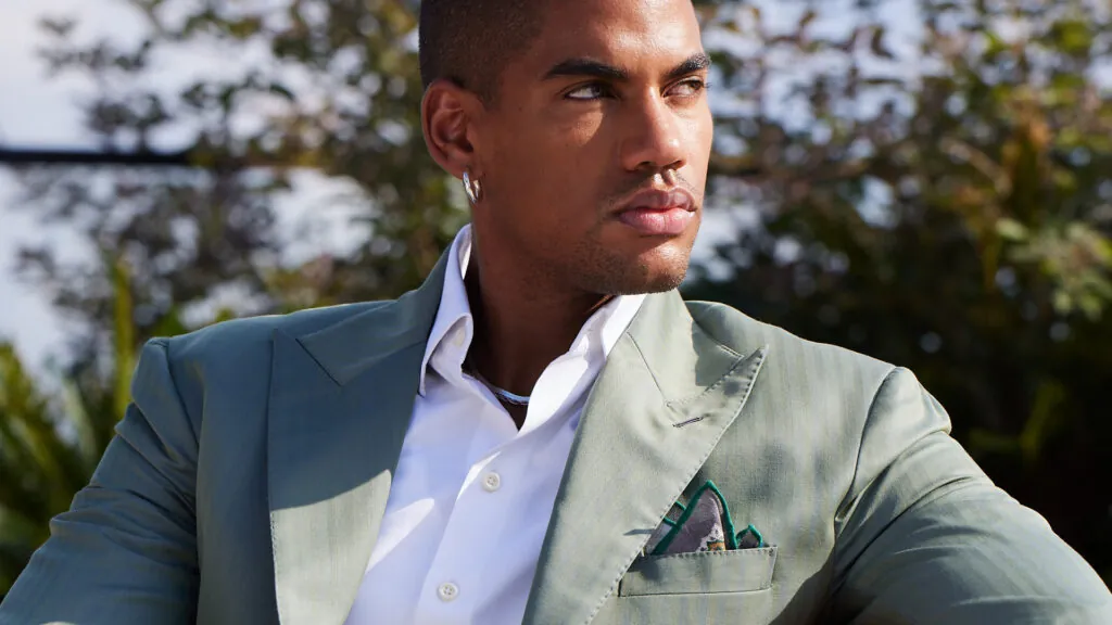 A Super 130s wool Solaro fabric in sage green, made into a full suit by Officine Paladino.